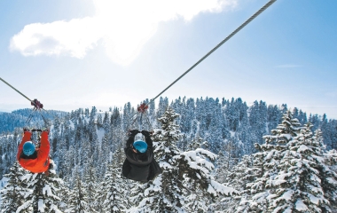 two people zip-lining on grouse mountain