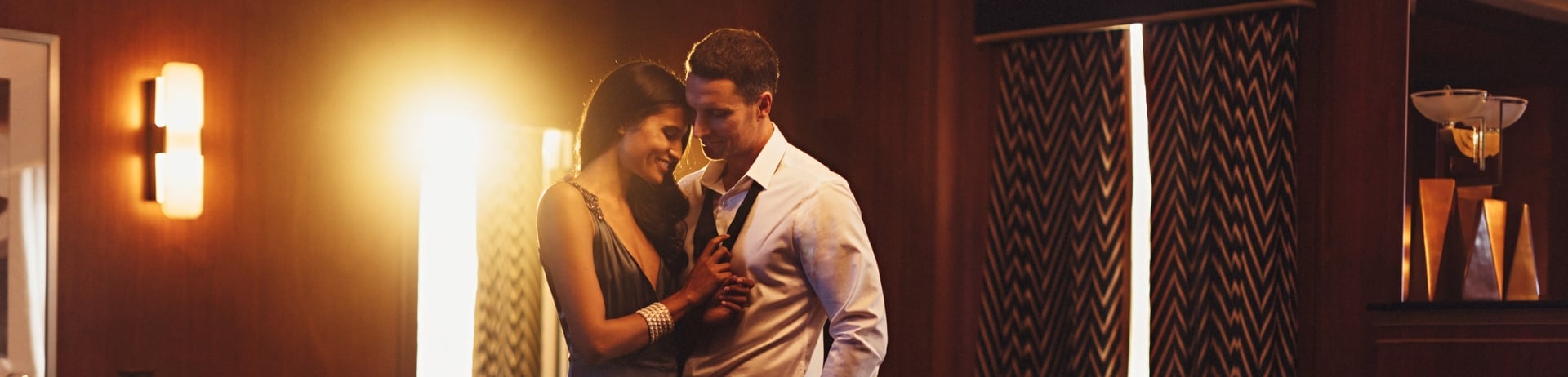 couple embrace in atmospheric room