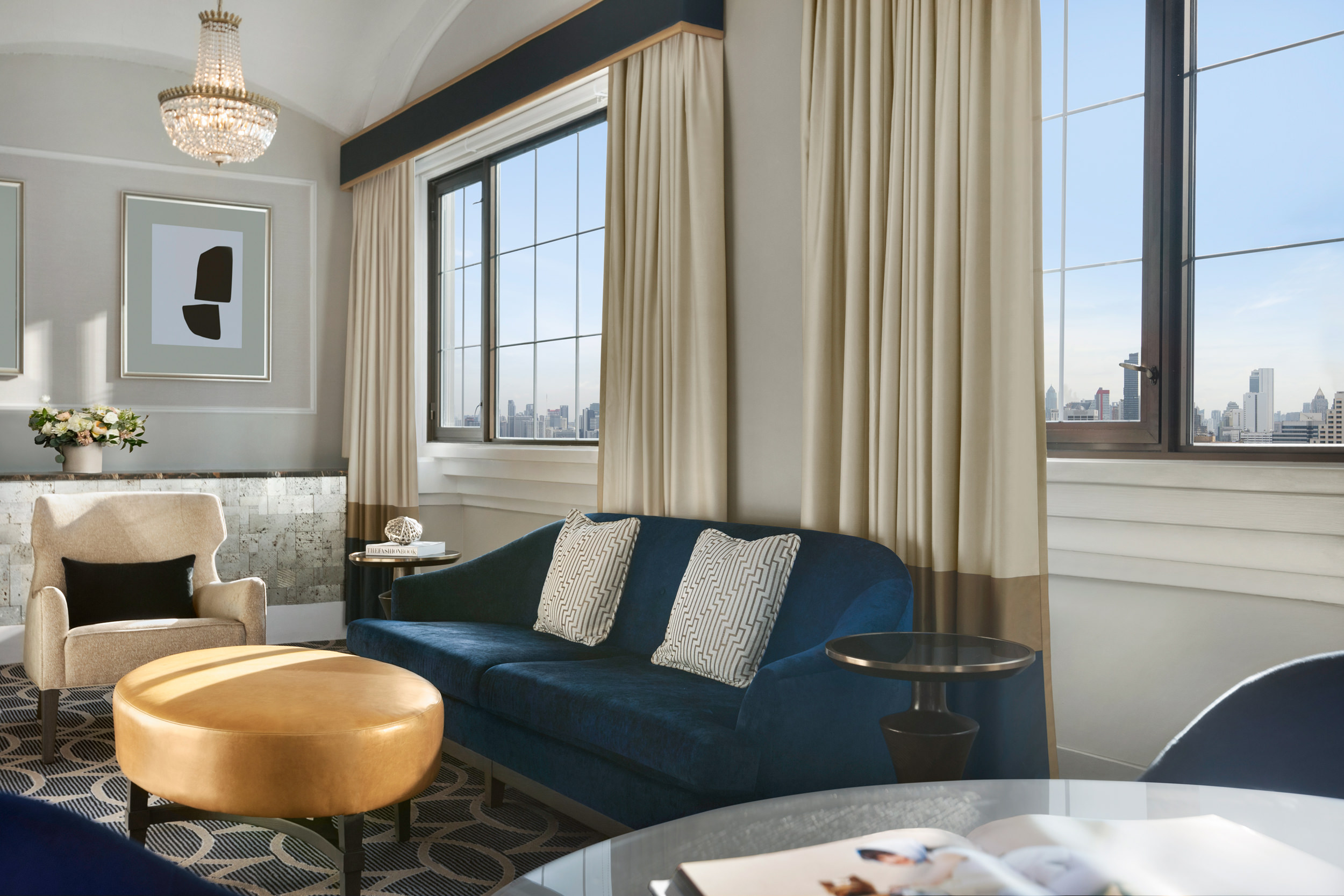 The Fairmont Gold Suite's sitting area with couch and chair.
