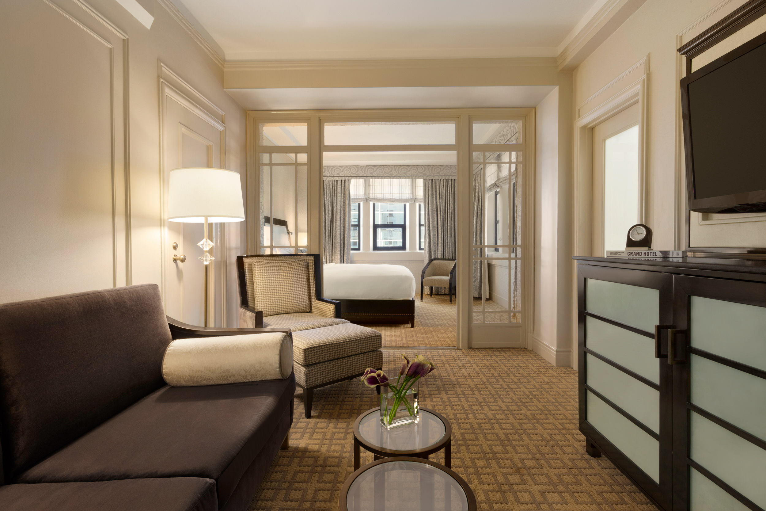 The Fairmont Junior Suite living room and separate bedroom