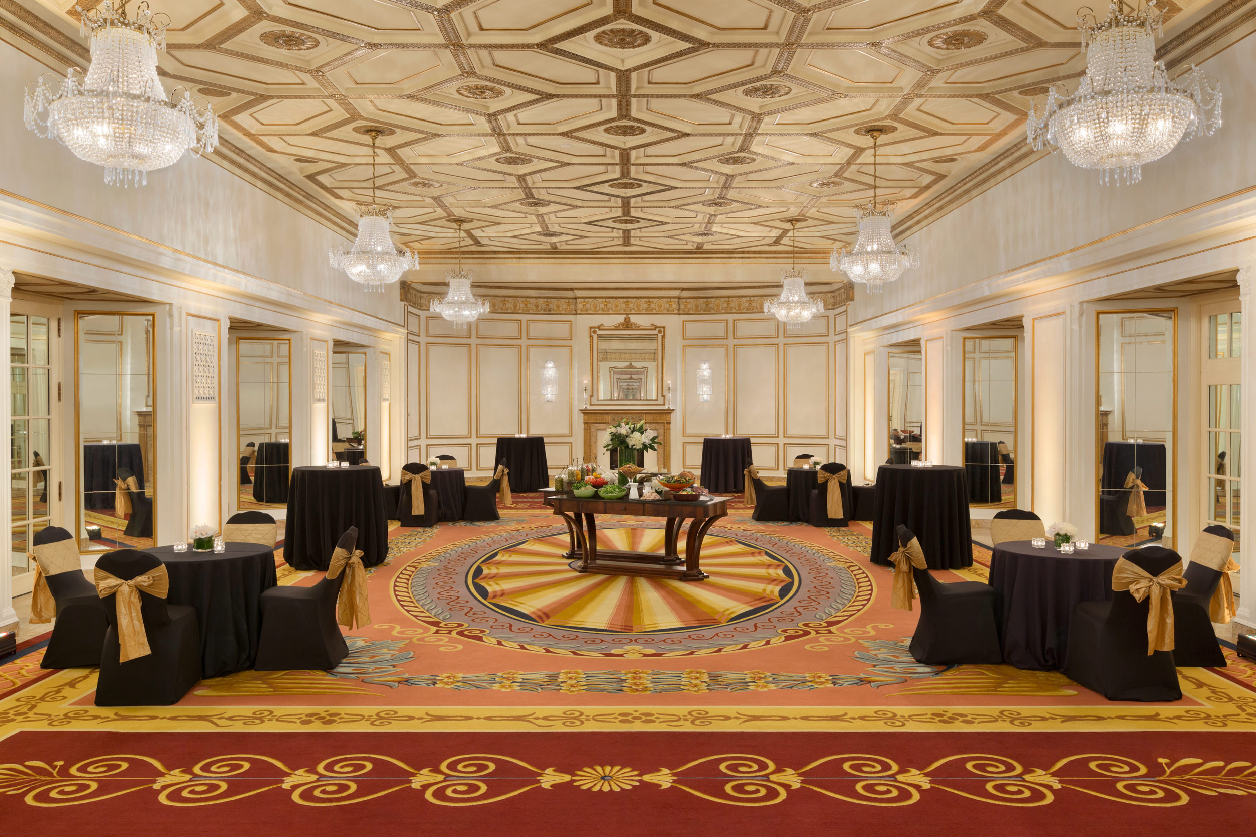 large room with tables and chairs set up for an event