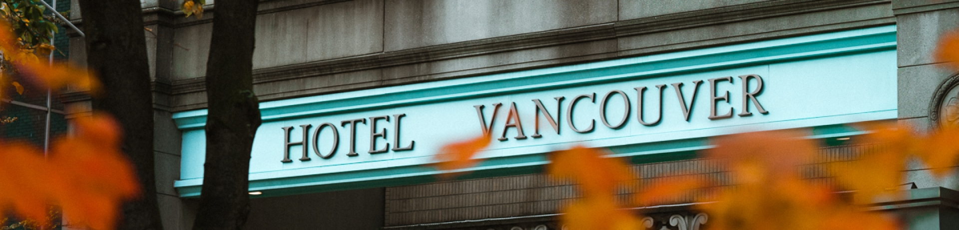 Copper sign for Hotel Vancouver in autumn
