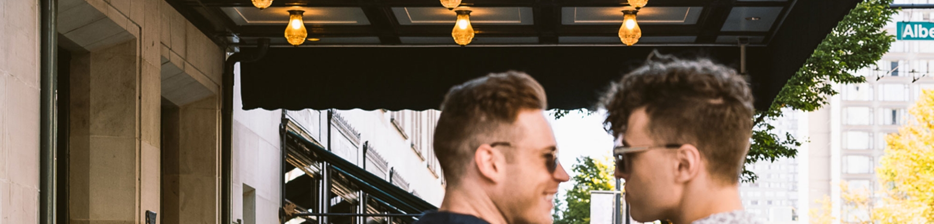 Gay couple outside of Fairmont Hotel Vancouver