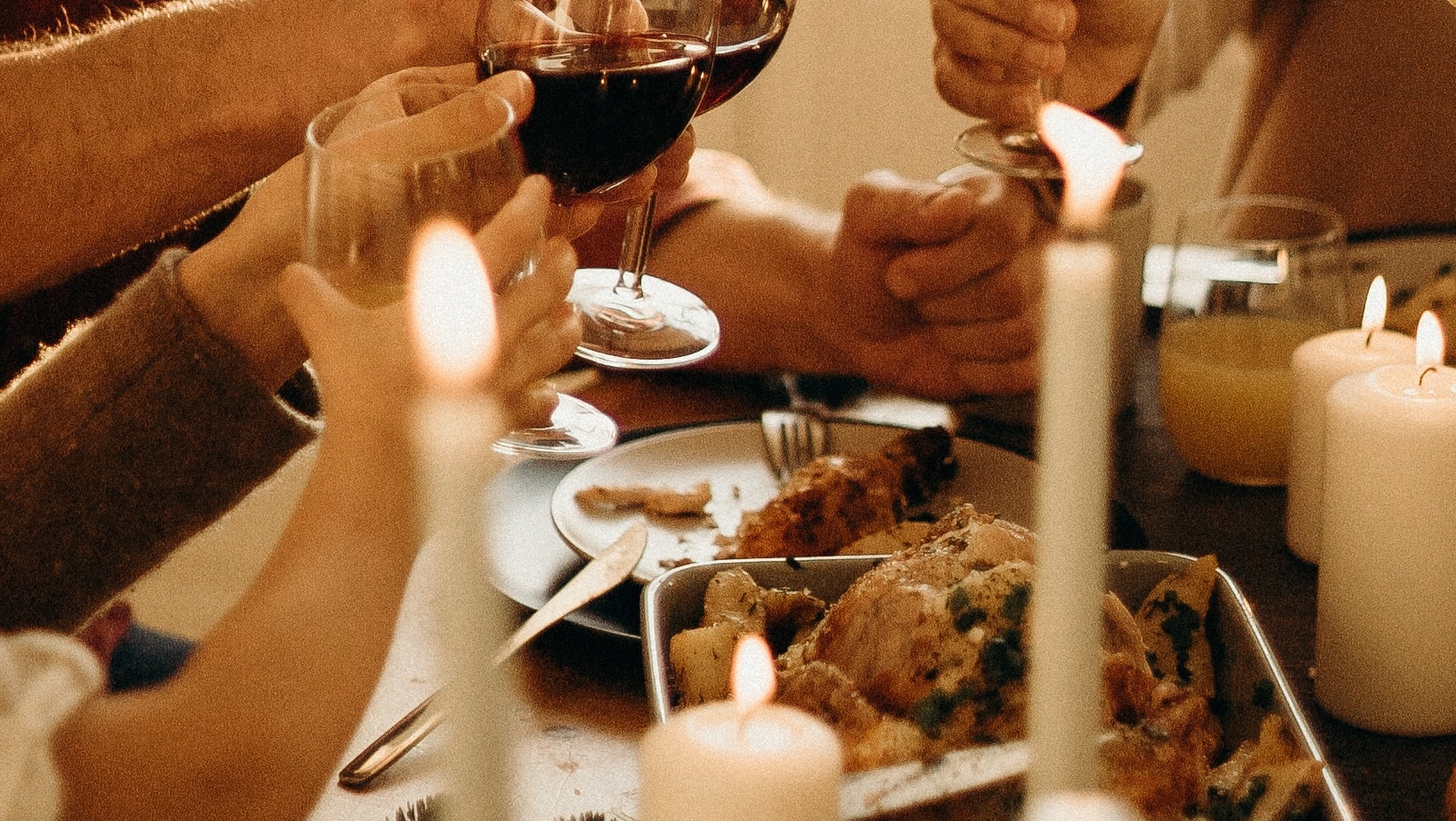 Thanksgiving meal with friends cheersing wine | Image: pexels-cottonbro-studio-3171200