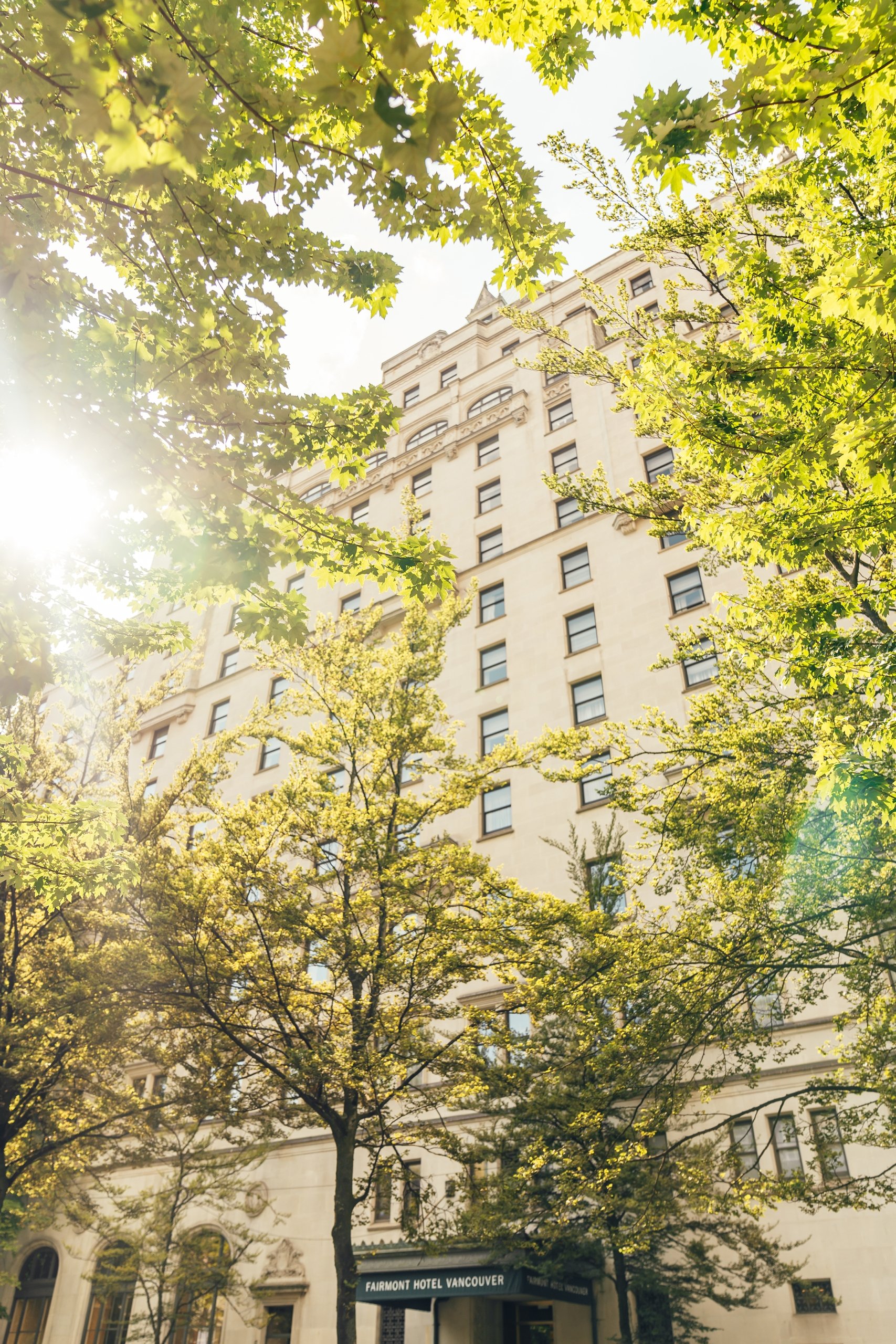 Exterior of Fairmont Hotel Vancouver in summer | Mark Hadj Hamou