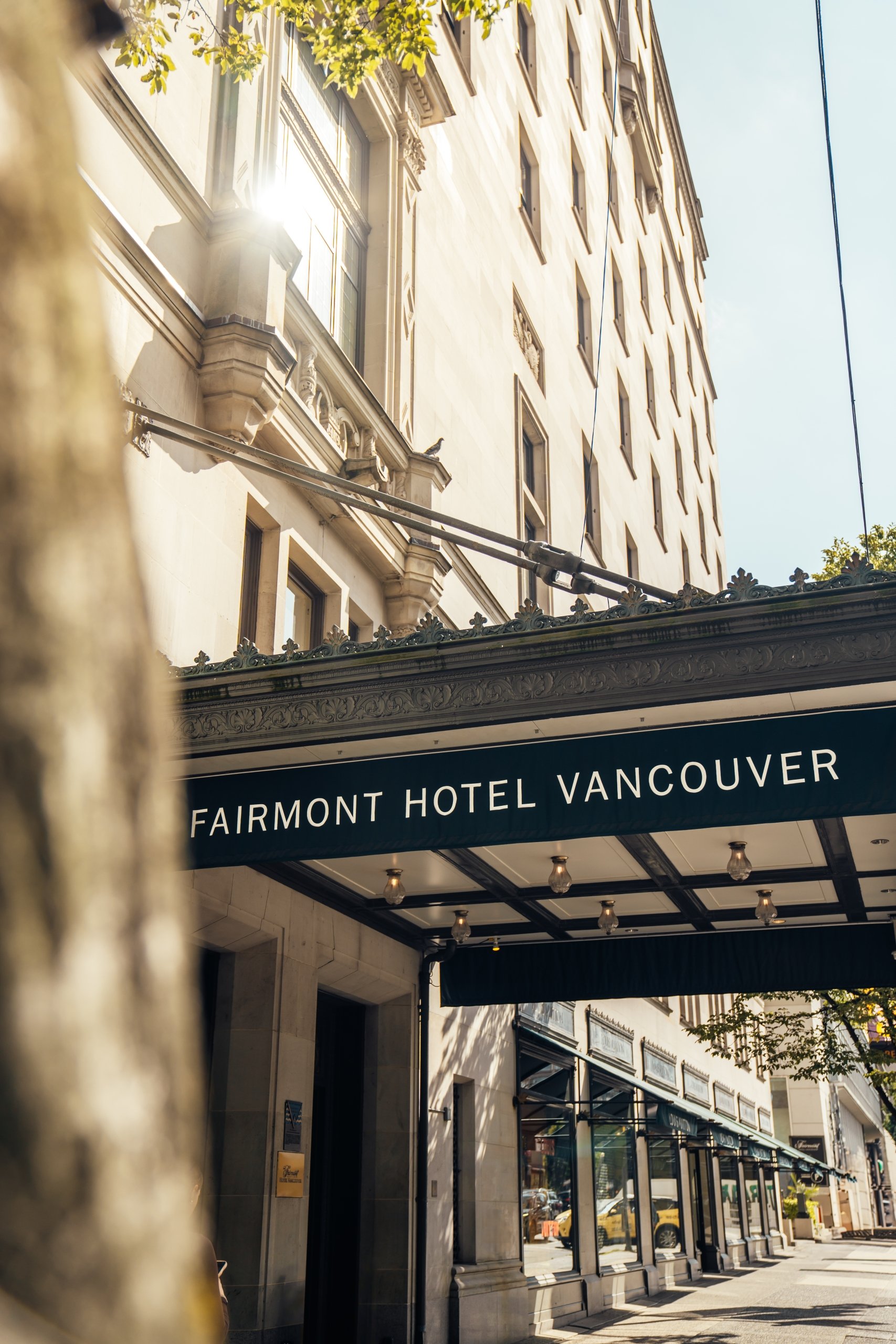 Exterior of Fairmont Hotel Vancouver in summer | Mark Hadj Hamou